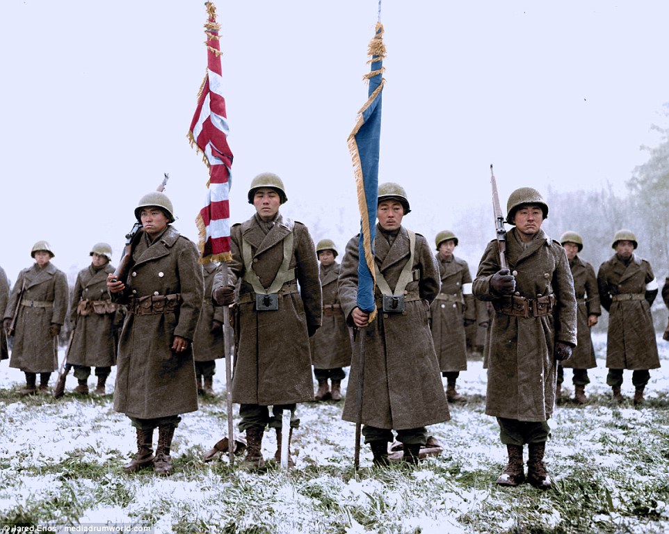 380DCEF700000578-3779356-Two_color_guards_and_color_bearers_of_the_Japanese_American_442d-a-18_1473325673621.jpg