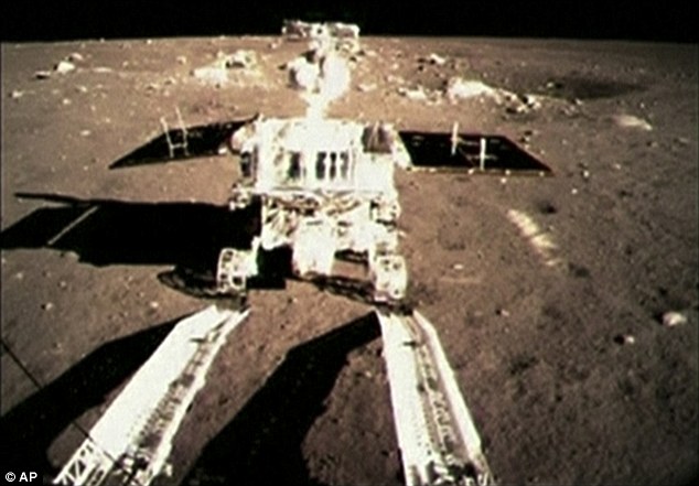 1A1D972D00000578-4067526-China_s_first_moon_rover_touching_the_lunar_surface_and_leaving_-a-9_1482837581202.jpg